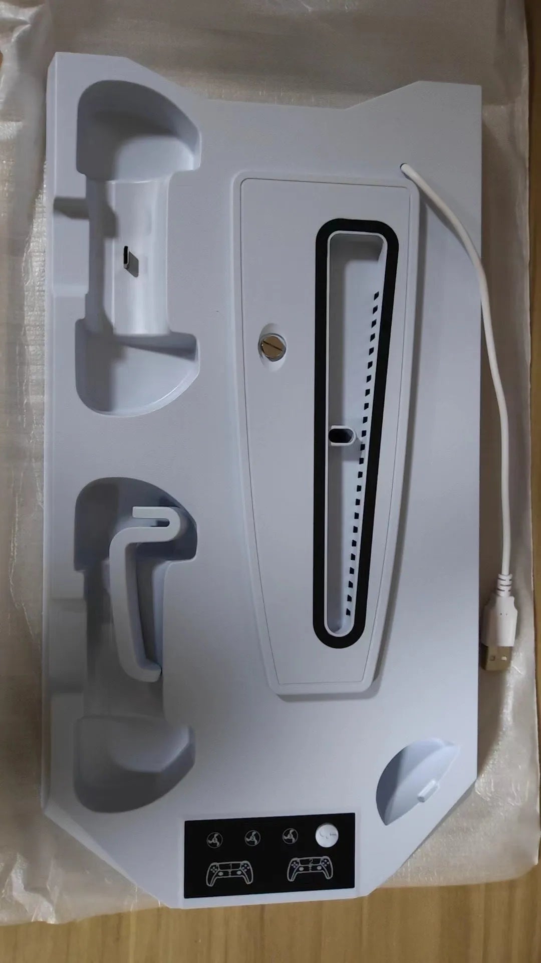 PS5 charging cooling station with controller storage slots and integrated fan in white or black