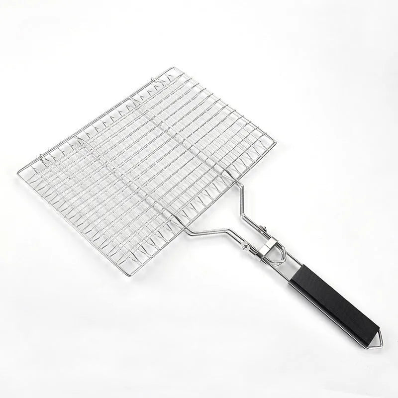 Square folding stainless steel barbecue mesh basket with a cleaning brush on a grill.