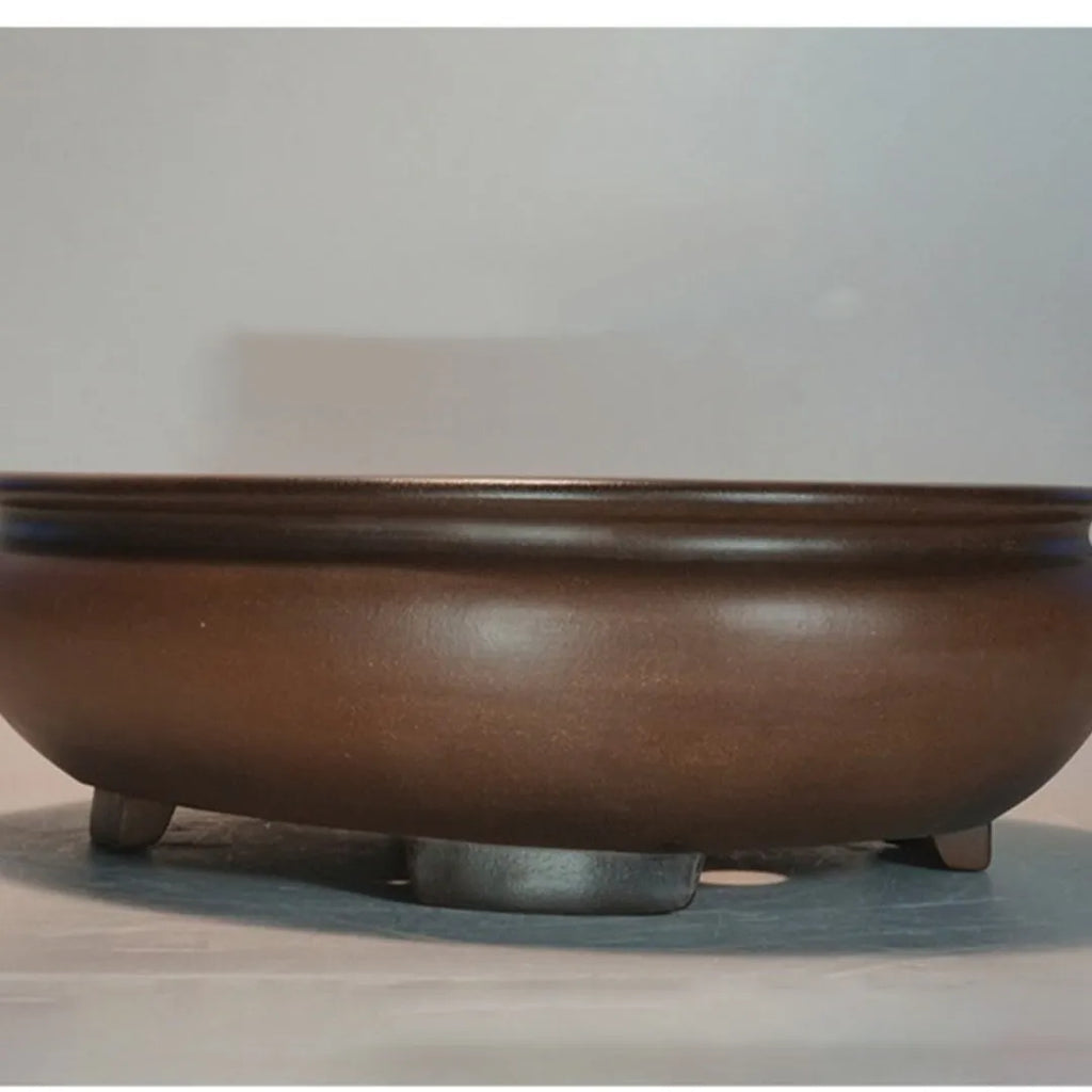 Handmade classical purple clay desktop flowerpot measuring 58 cm wide by 47 cm high.