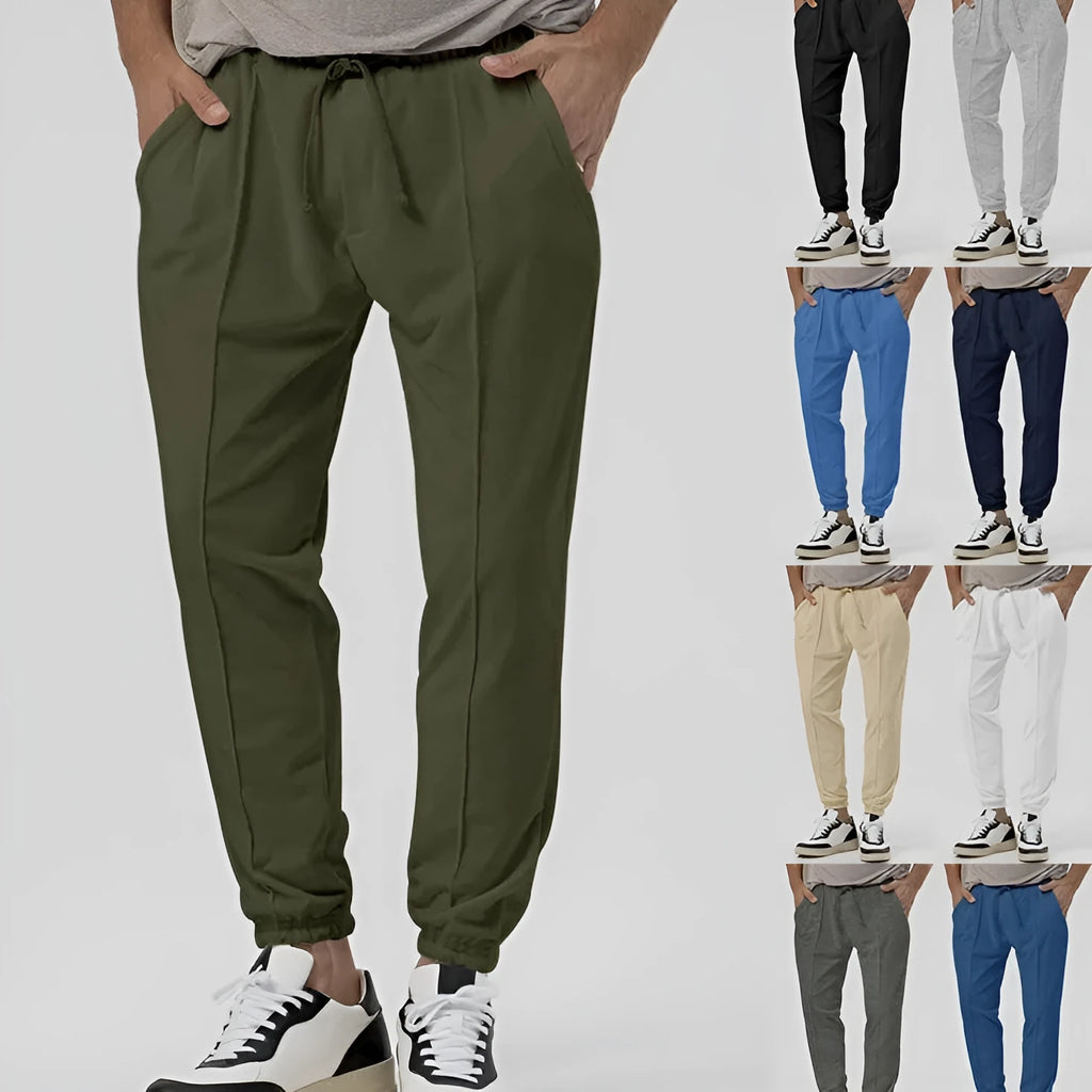 Men's grey casual tapered sweatpants with an elasticated waistband and straight-leg design