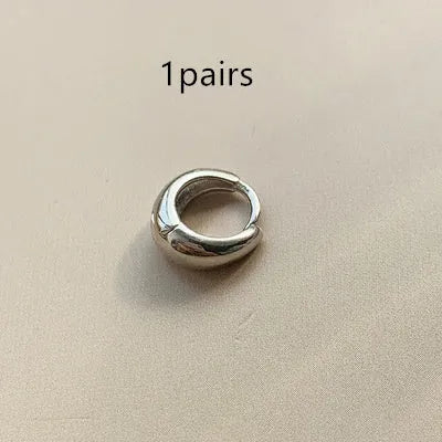 Retro-style geometric water drop earrings for women in gold and silver finishes, showing large, medium, and small sizes.