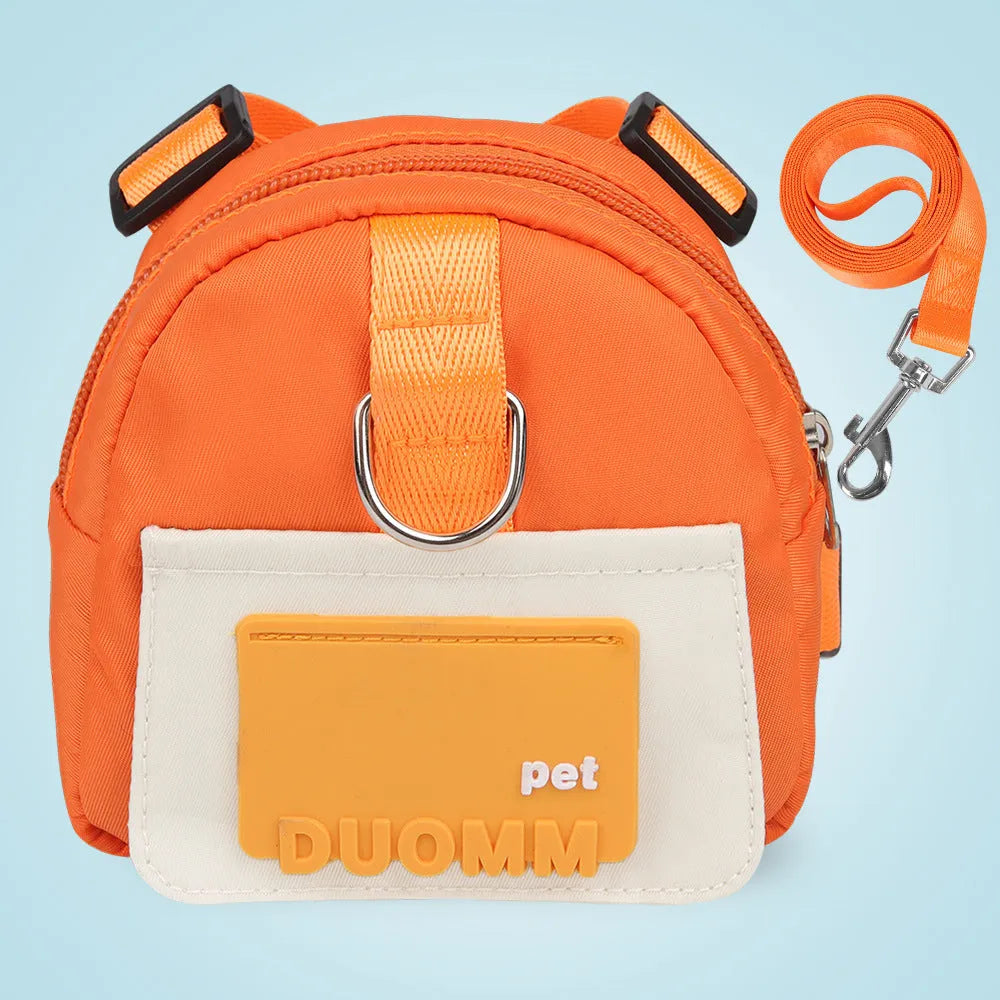 Blue adjustable dog harness backpack with breathable mesh panels and a tow rope attached.