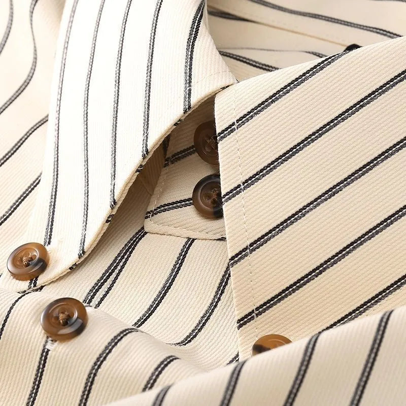 Coffee coloured striped men's long-sleeved shirt with a slim fit, shown on a hanger.