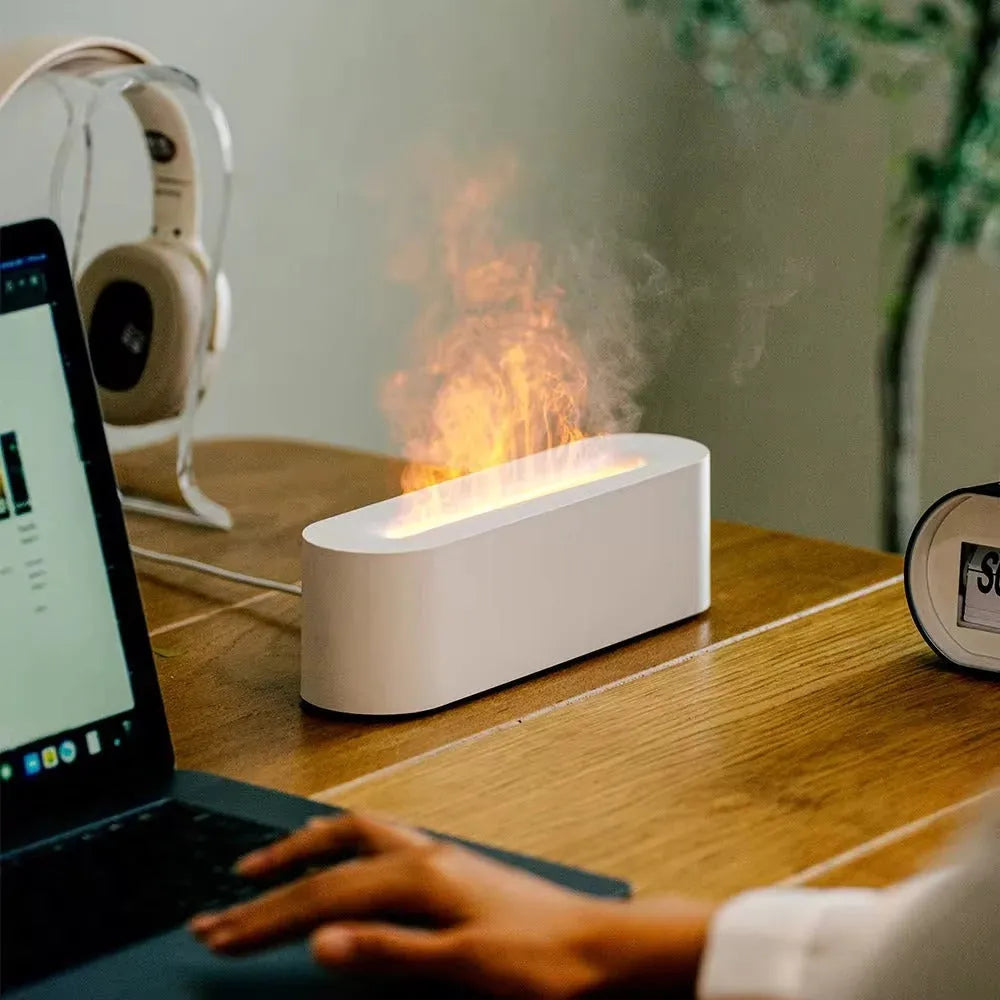 Square black creative lava lamp USB desktop humidifier and essential oil diffuser on a wooden desk.