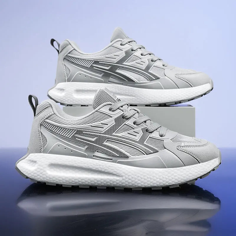 Casual non-slip popcorn shock absorption sneaker with KPU network upper in white, black, or light gray.