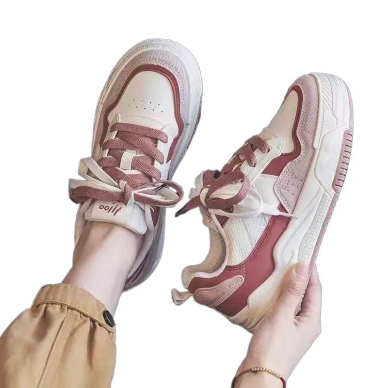 Women's low top sneaker in beige and pink with rubber sole
