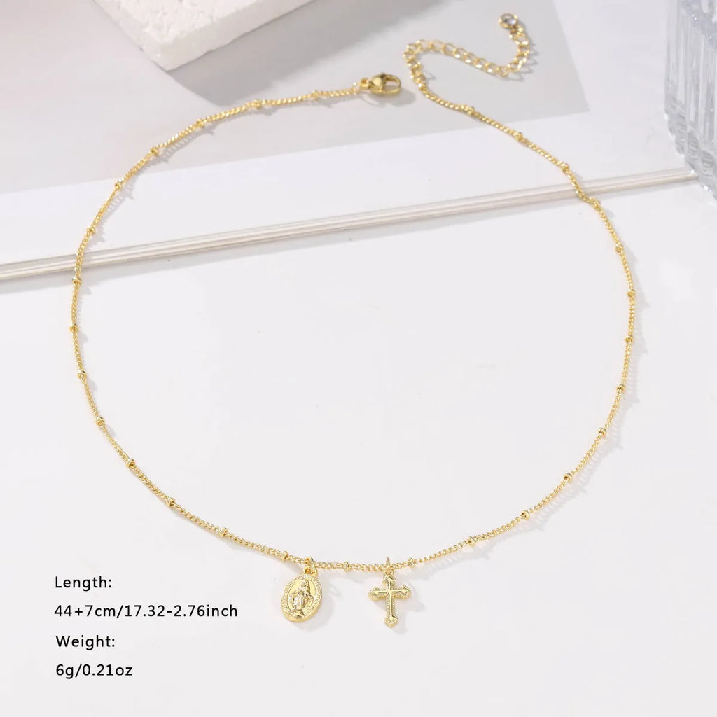 Gold geometric Virgin Mary cross necklace pendant on chain