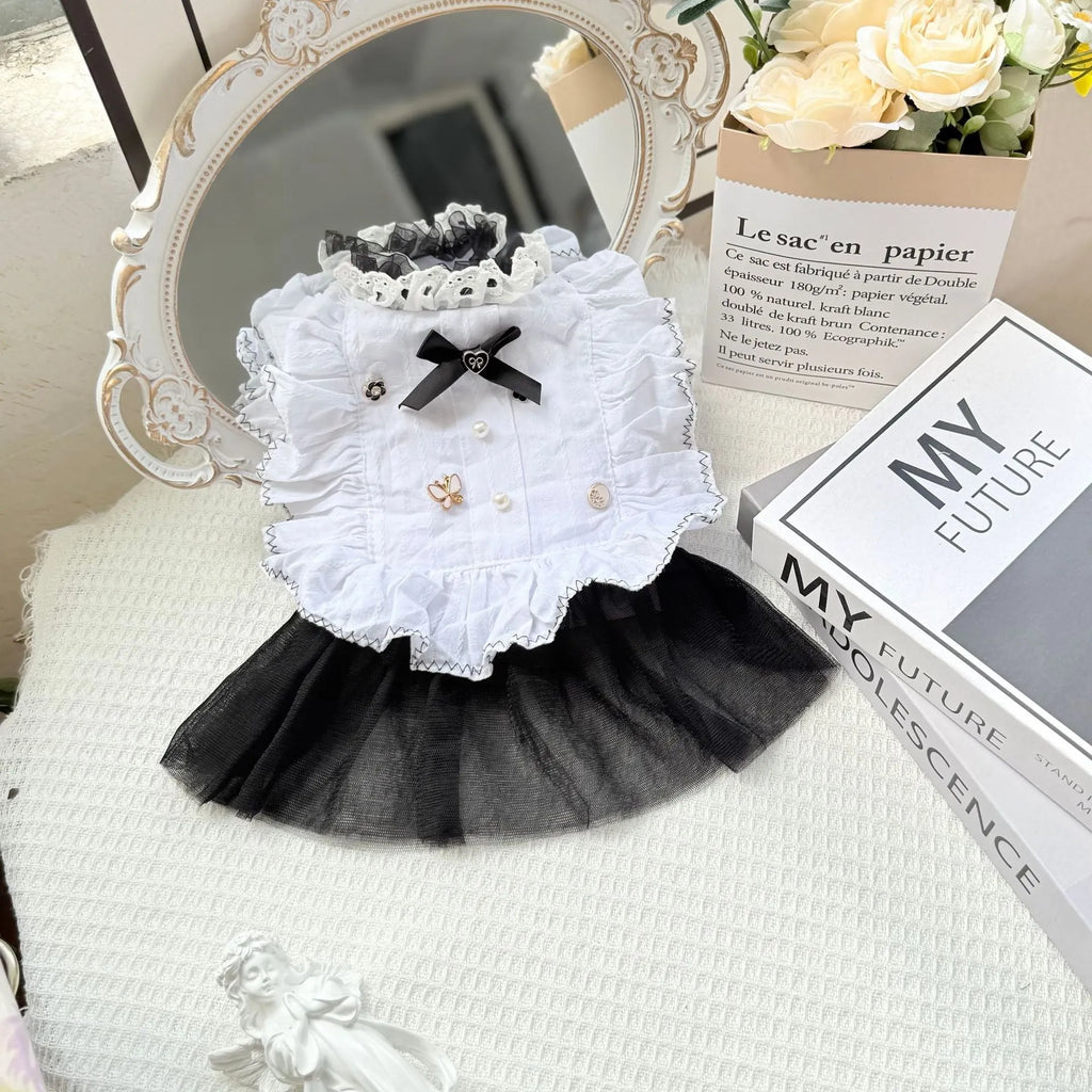 White polyester princess-style dog dress with a gauze skirt for small dogs.