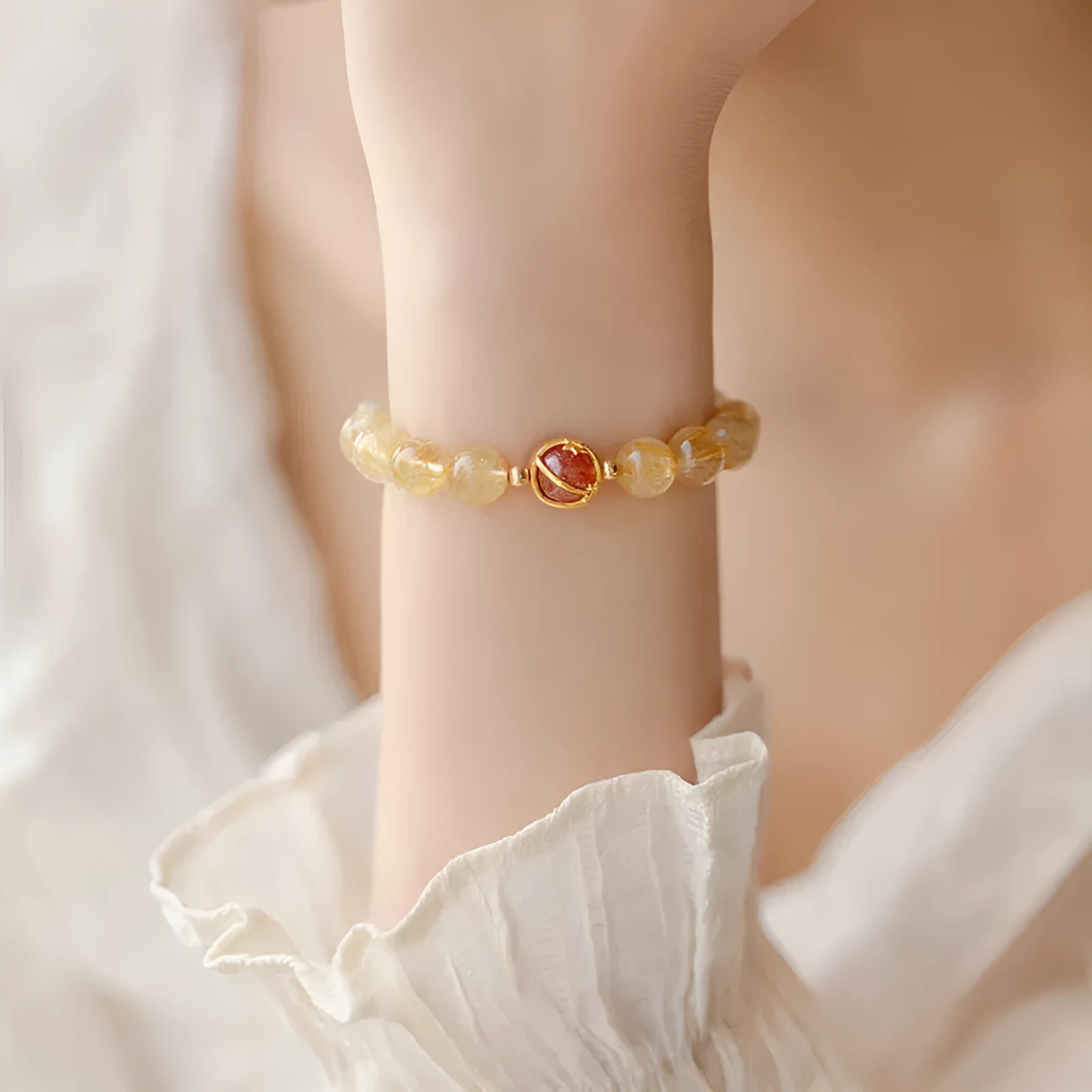 Gold rutilated quartz crystal bracelet with diamond shaped beads in Korean style design