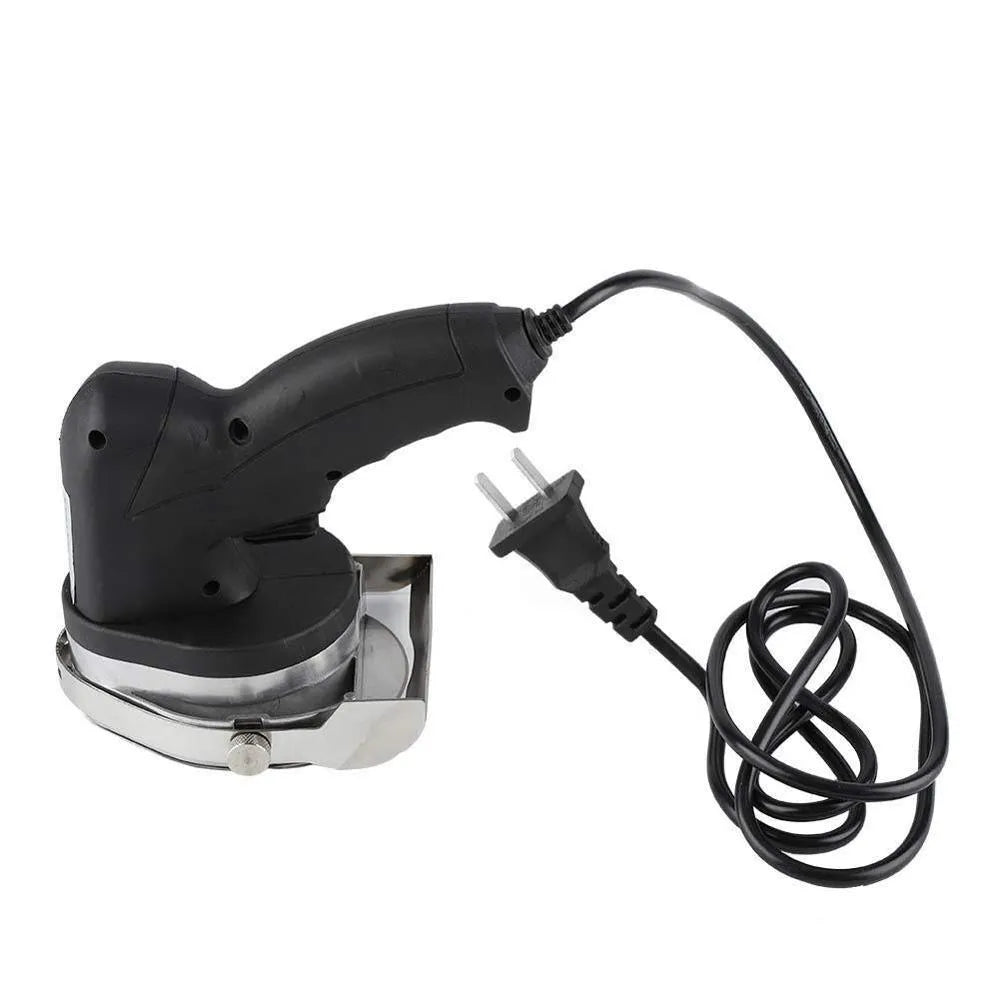 Black electric meat cleaver with EU plug for processing turkey and barbecue meats.