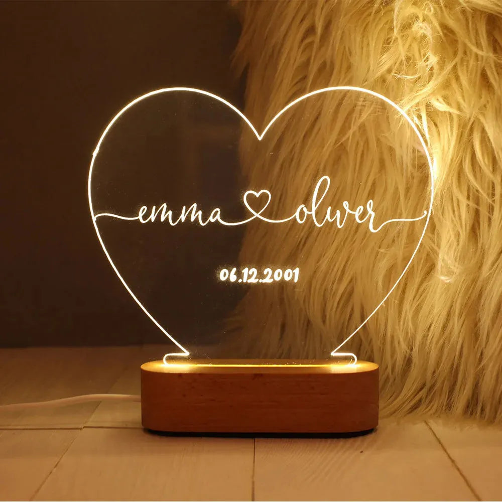 Custom acrylic night light with personalised names and date, showing dimensions of 20cm by 11.5cm.