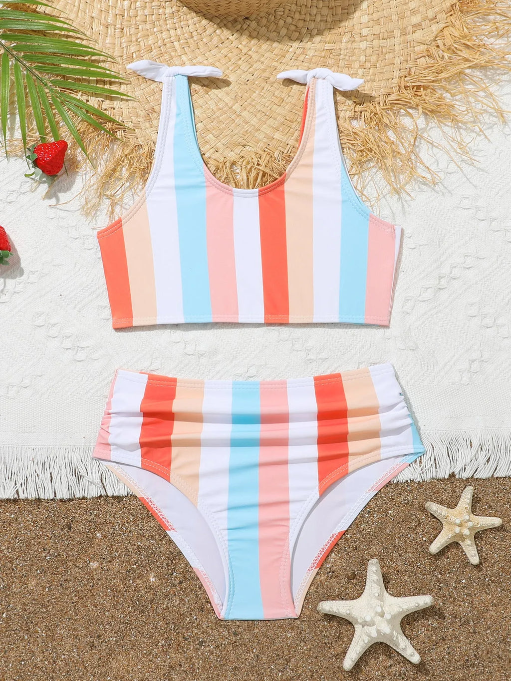 Girls' plaid print two-piece swimsuit set with bra top and briefs for swimming.
