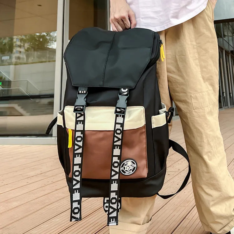 Oxford cloth fashion backpack in black, green, or red, shown with adjustable straps for multiple carrying styles.