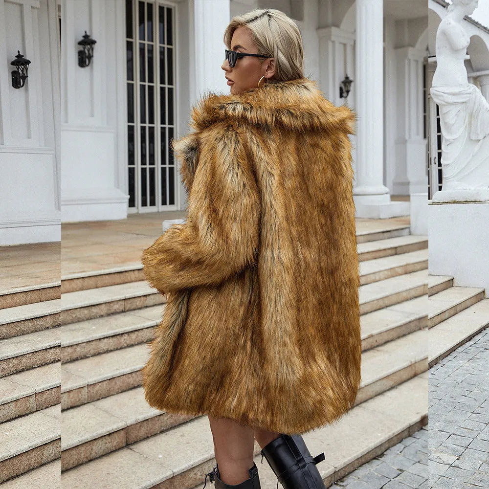 Yellow women's long faux fur coat with a loose casual fit and regular sleeves.