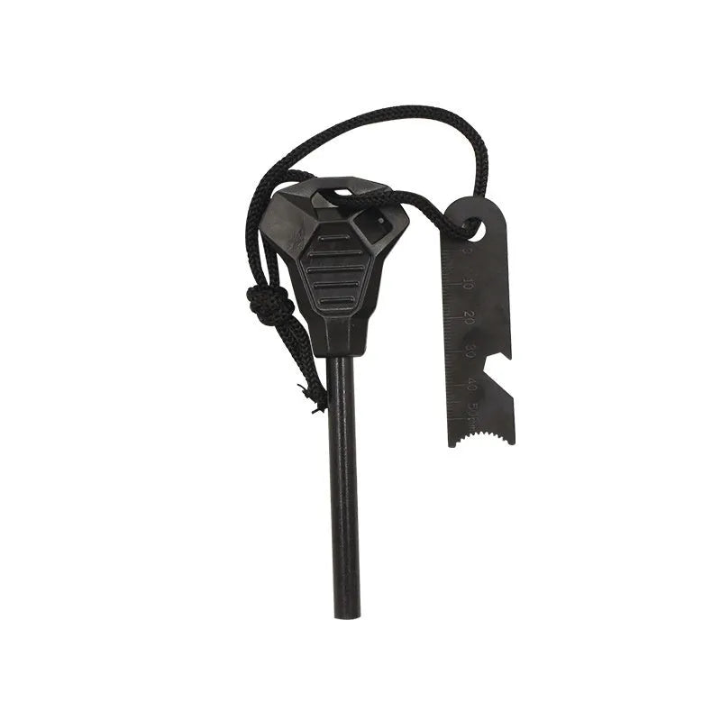 Black outdoor multifunctional flint with magnesium rod, stainless steel scraper, and survival whistle.