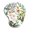 Black silicone keyboard pad with wrist strap and floral pattern, rubber sole visible underside