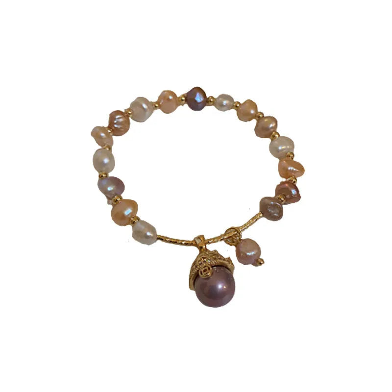 Baroque freshwater pearl zircon bracelet with geometric inlaid design and magnetic clasp on a white background