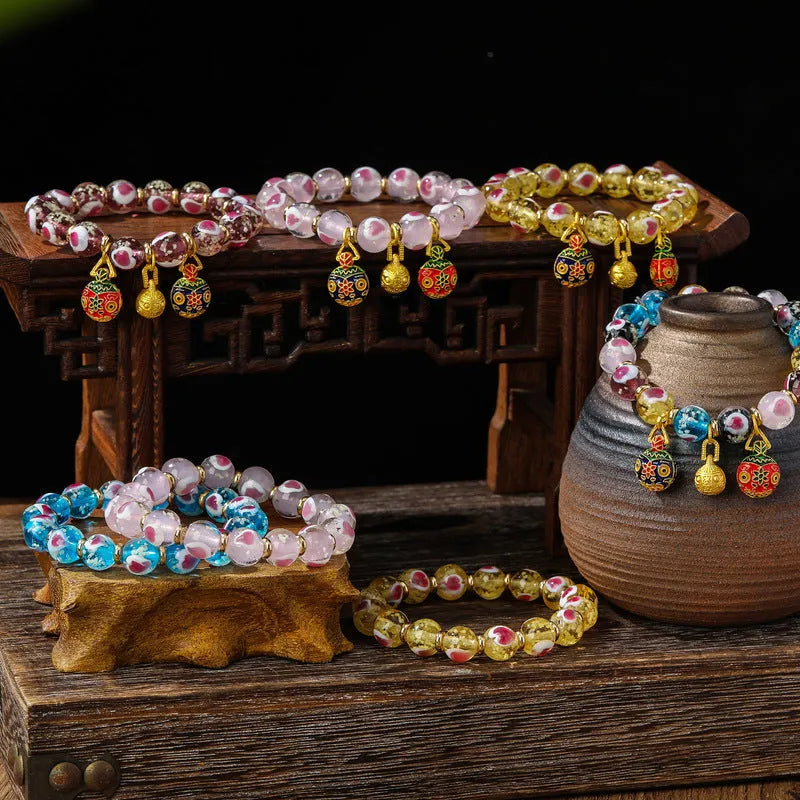 Swallowing gold beast cherry blossom powder heart bracelet with 10mm beads in six colour options