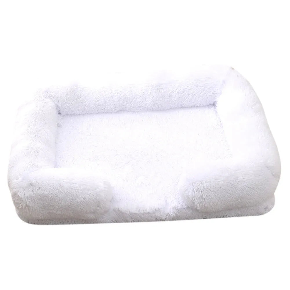 Plush round dog bed in a chosen colour, showing soft texture and raised edges, with a removable inner sleeve.