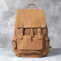 Brown crazy horse leather backpack with double shoulder straps and soft handle