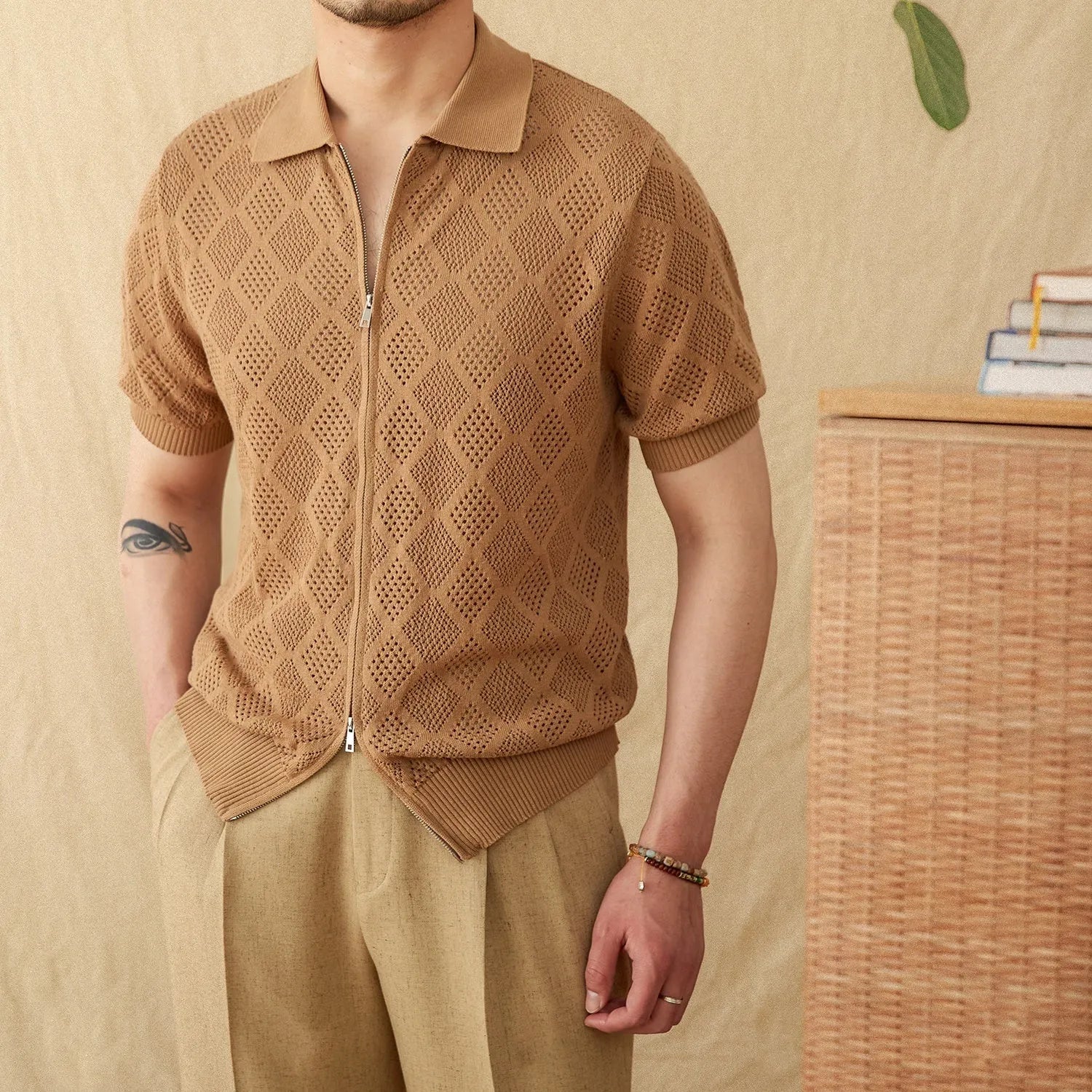 Light brown cotton casual cardigan with zipper and lapel collar on a hanger.