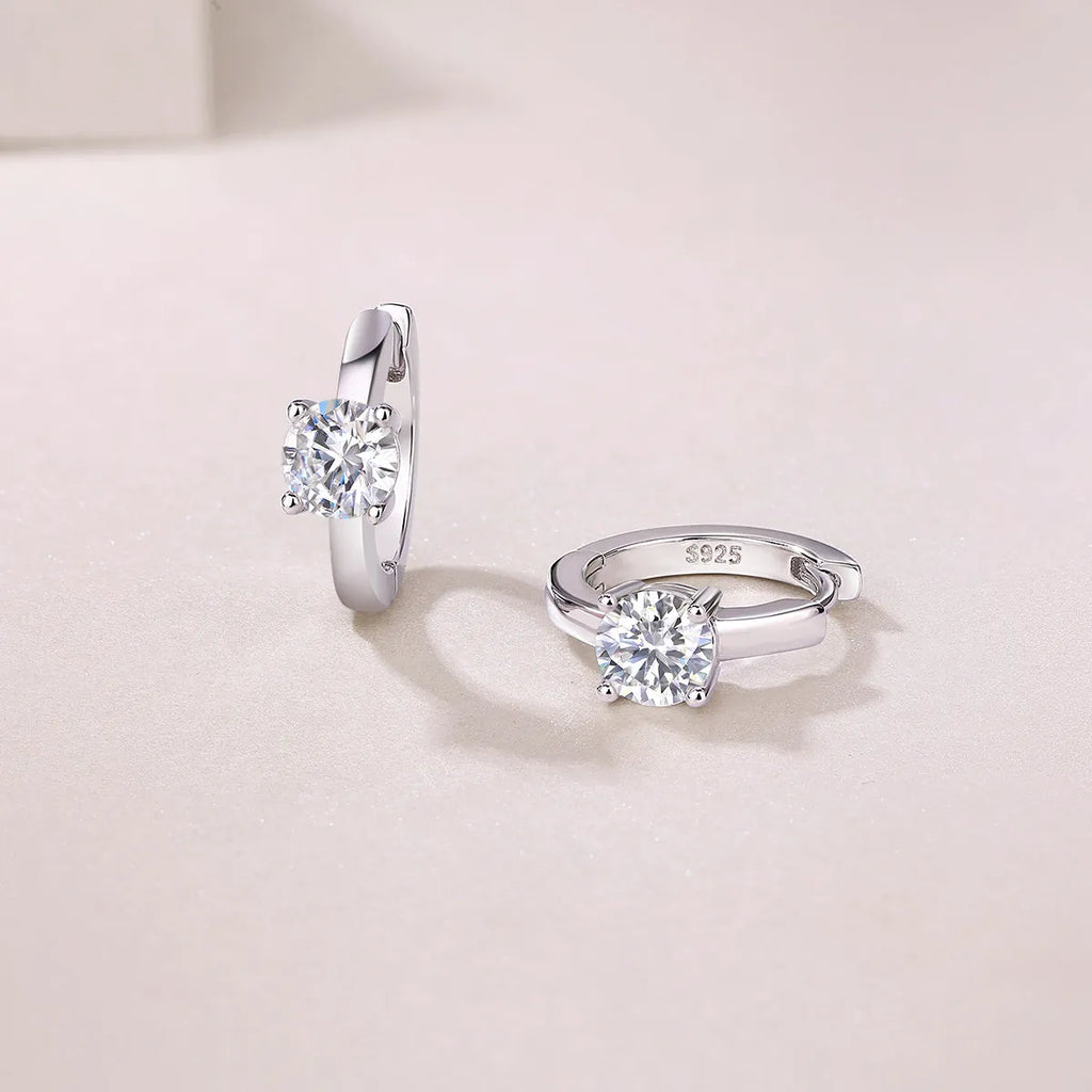 0.5-carat top-quality moissanite stud earrings in S925 silver with platinum plating on white background