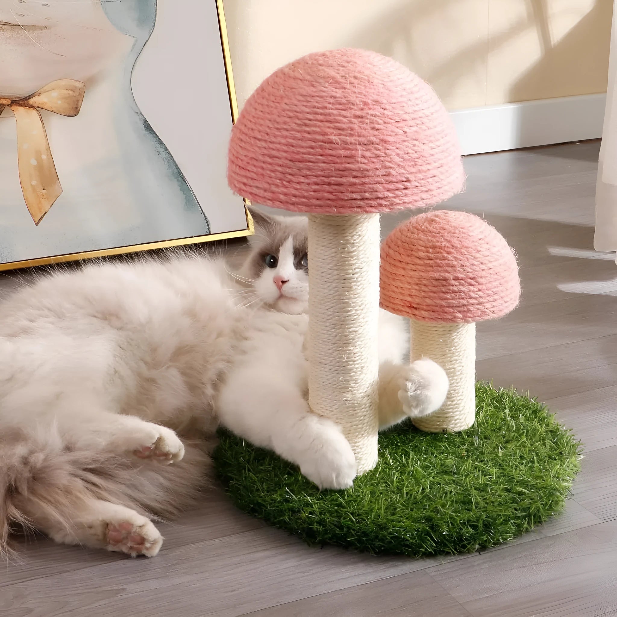 Pink mushroom-shaped cat scratching post with natural sisal covering for kittens and small cats