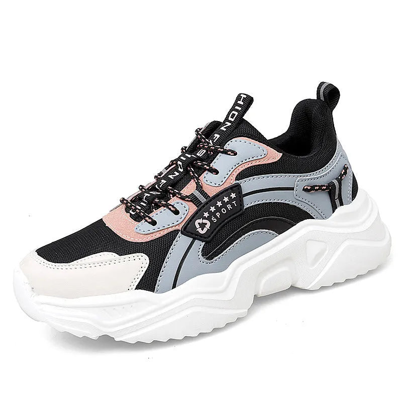 White women's casual sports shoes with mesh upper, thick PU sole, round toe, and a buckle strap.