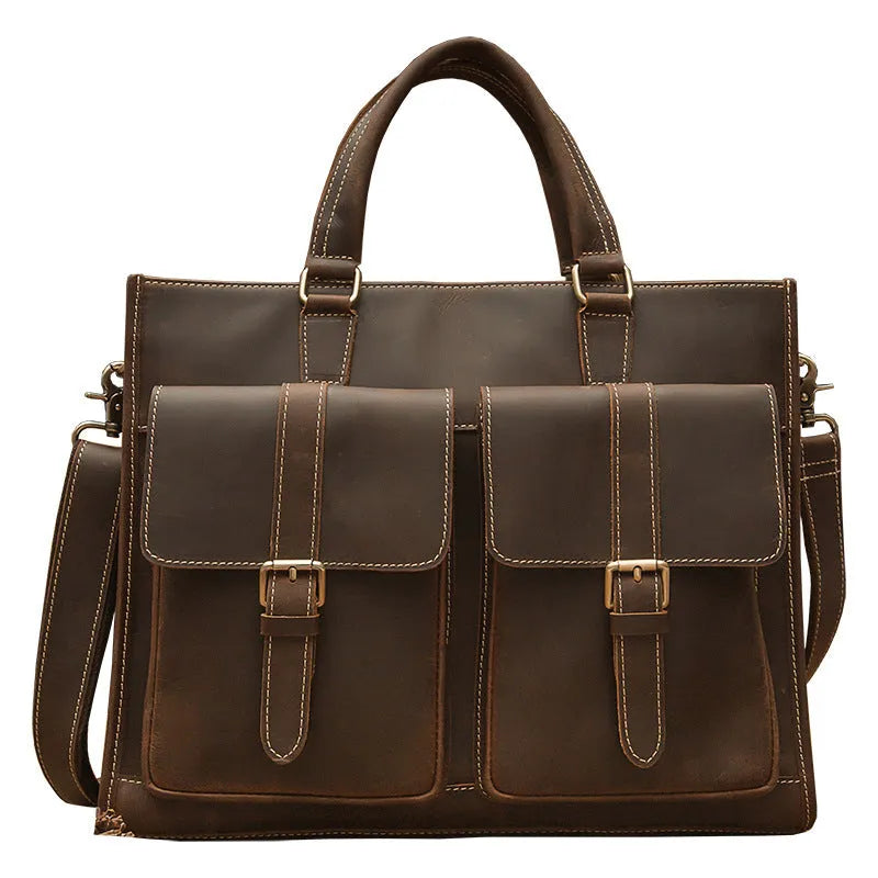 Handmade dark brown leather men's briefcase with top layer cowhide texture holding a 15-inch notebook and folder