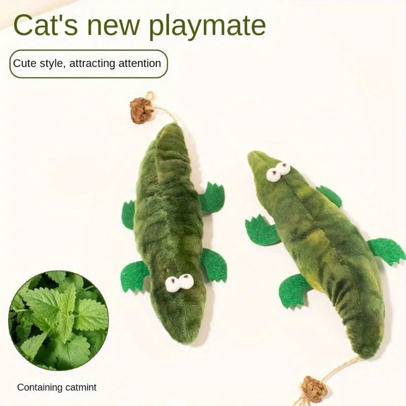 Green plush alligator cat toy with plant-based materials and peppermint scent for oral care