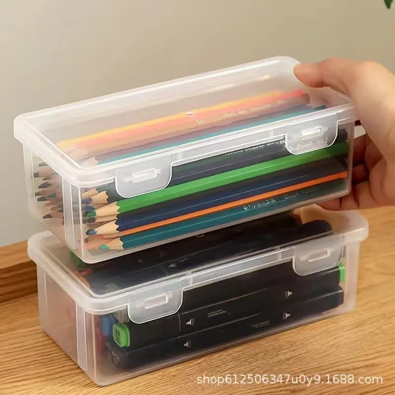 Clear plastic pencil storage box filled with colouring pencils and wax crayons.