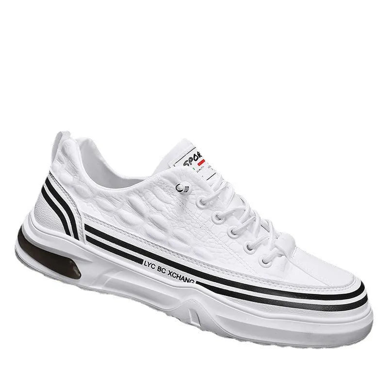 Youth low-top slip-on canvas sneakers in white black, side view