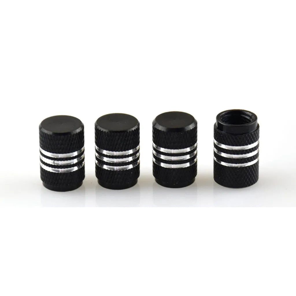 Set of stainless steel car tyre valve caps in multiple colours including red, blue, black, and silver.