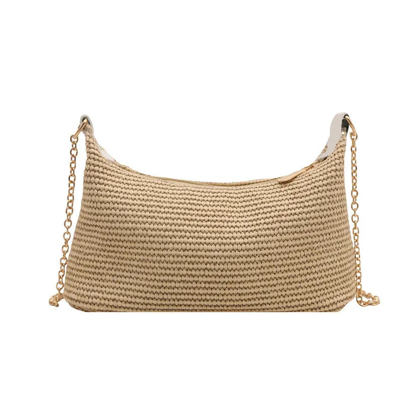 Woven straw shoulder tote bag in khaki colour with sandwich pocket design and internal phone compartment