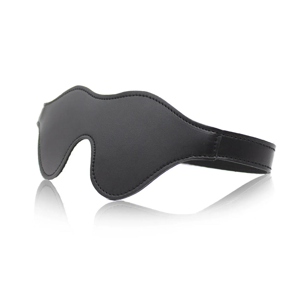 Women's leather eye mask with velcro fastening showing three-dimensional contour design in multiple colour options
