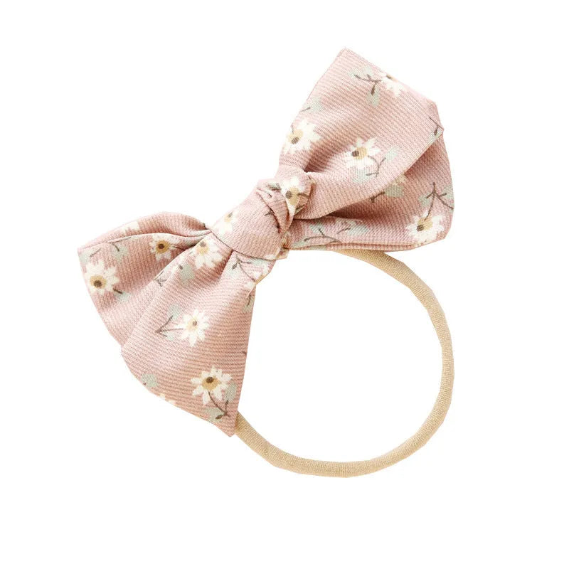 Children's knotted bow hair ring made of cloth in a Princess series Snow White design.