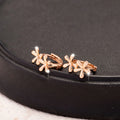 A pair of circular rose gold waterdrop flower earrings for women with a fresh, sweet style.