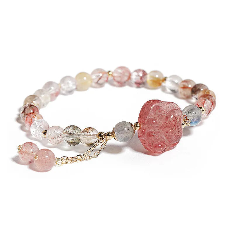 Women's natural crystal bracelet with manual craftsmanship showing animal zodiac designs