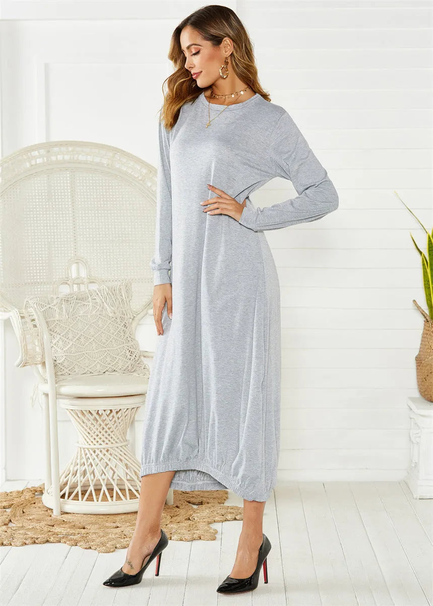 Black long lantern dress with lace-up crew neck and loose knit fit, shown on a model.