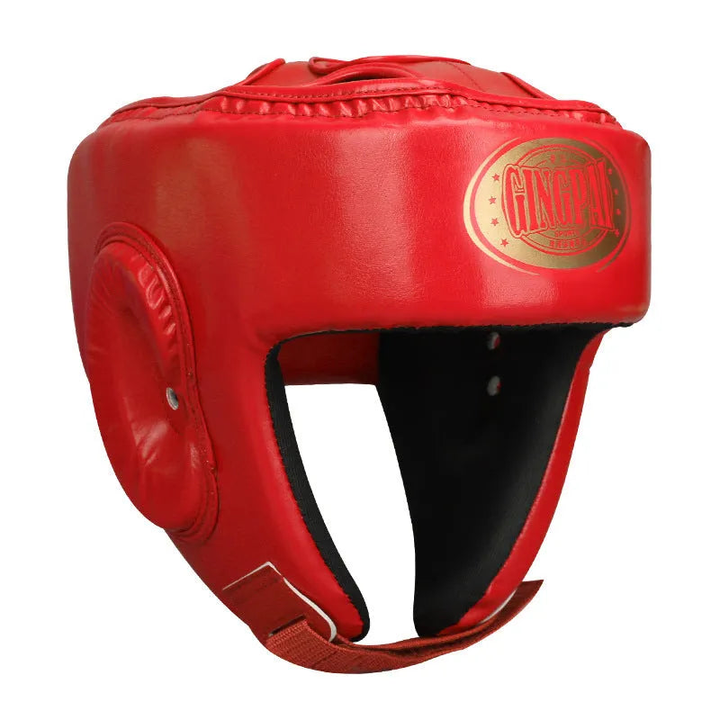 Fully enclosed boxing helmet with jaw protection in red colour, showing vertical ventilation channels