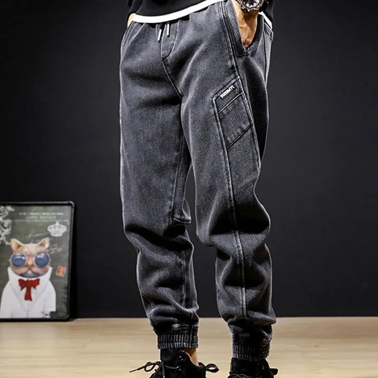 Plus size loose tapered work jeans with wool lining in grey, camel, or black, sizes M to 5XL