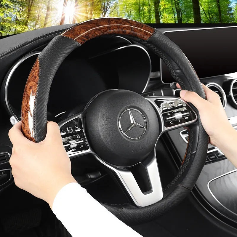 Leather steering wheel cover with crystal texture in black brown colour, round style, on a car steering wheel
