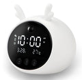 Smart alarm clock with voice dialogue and motion sensor in animal design with luminous display