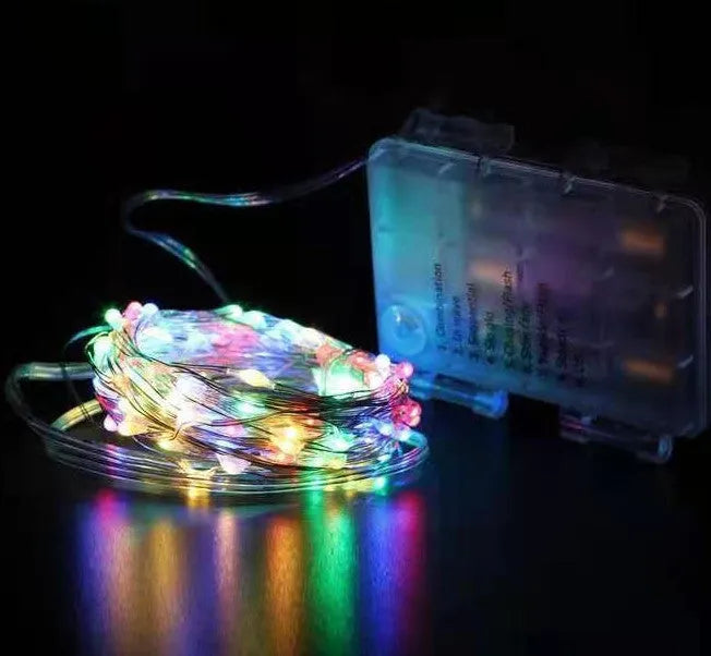 12 metre long copper wire LED string lights in multiple colours, powered by batteries or USB.