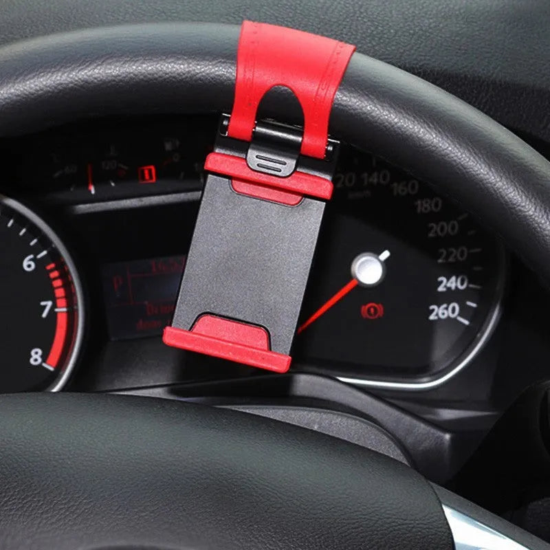 Black universal car steering wheel clip mount holder for mobile phones and GPS units.
