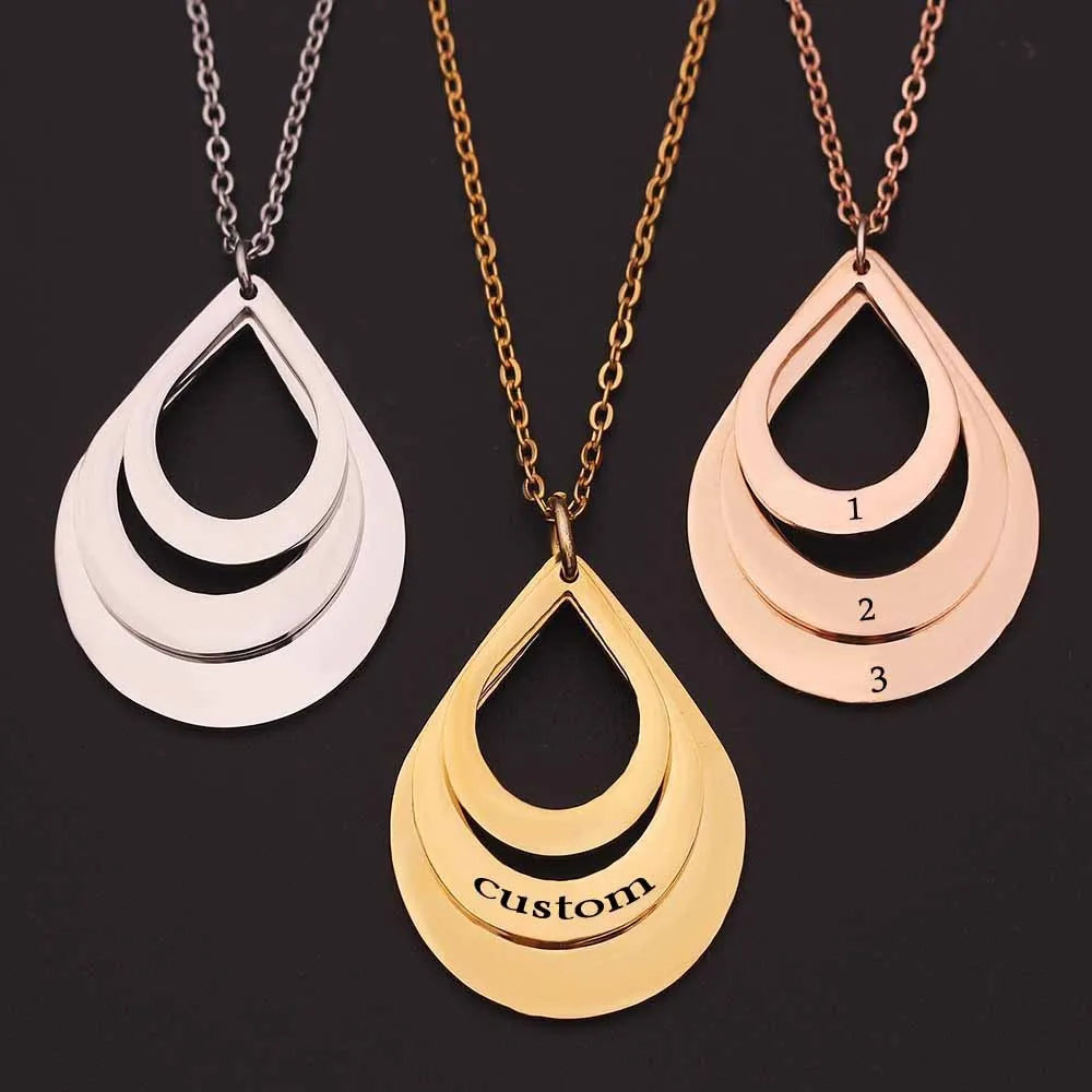 Custom engraved stainless steel pendant necklace with three water droplet design in gold, silver, and rose gold
