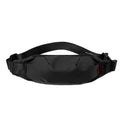 Black Oxford cloth crossbody waist pack with zip closure, shown with internal phone and ID pockets visible.