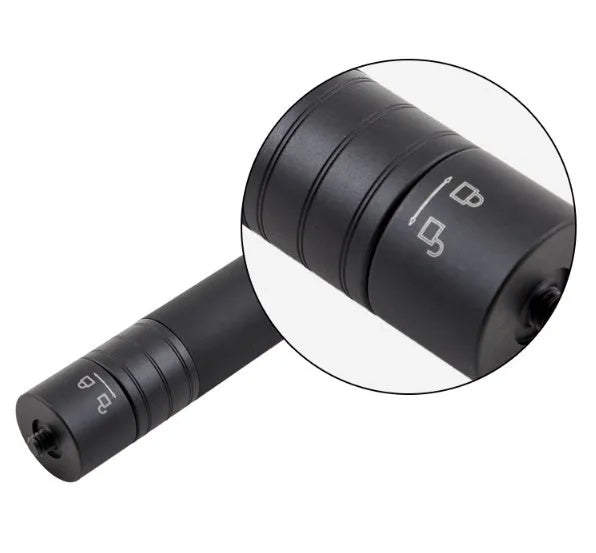 Black retractable aluminium selfie stick extended to full length with a smartphone attached in the clamp.