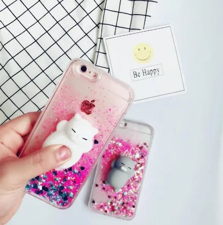Set of four colourful glitter phone cases featuring cat designs for iPhone models.