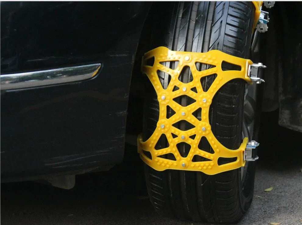 Yellow universal snow chain made from widened thickened TPU with steel nails for non-slip winter traction